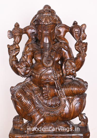 Preety Polished Ganapathi Simply Seated on Auspicious Lotus Wooden Handmade Sculpture 24"
