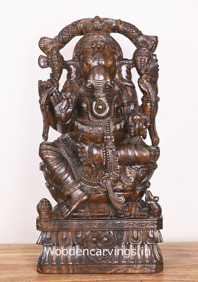Decorative Lord Ganesha Carved With Beautiful Arch Garland Seated on Flower Lotus Polished Sculpture 25"