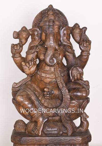 Shree Ganesha Seated on Lotus and Holding Sweet Prasad Mothak Wooden Wax Brown Handmade Sculpture 24"