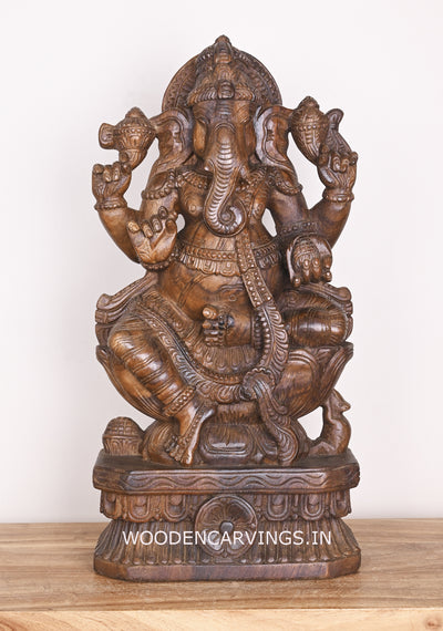 Shree Ganesha Seated on Lotus and Holding Sweet Prasad Mothak Wooden Wax Brown Handmade Sculpture 24"