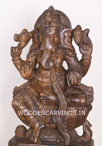 Shree Ganesha Seated on Lotus and Holding Sweet Prasad Mothak Wooden Wax Brown Handmade Sculpture 24"