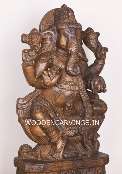 Shree Ganesha Seated on Lotus and Holding Sweet Prasad Mothak Wooden Wax Brown Handmade Sculpture 24"