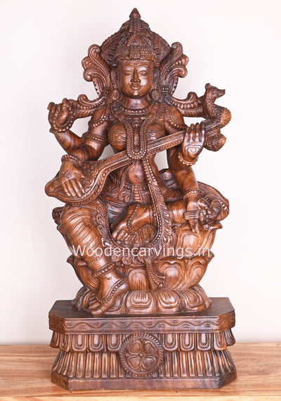 Detaily carved Attractive Gorgeous Devi Saraswathi Holding Veena Wax Brown Showpiece Sculpture 36"