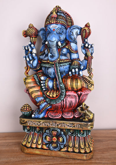Sky Blue Coloured Maha Ganapathi Seated on Pink Lotus Handmade Wooden Multicoloured Sculpture 24"