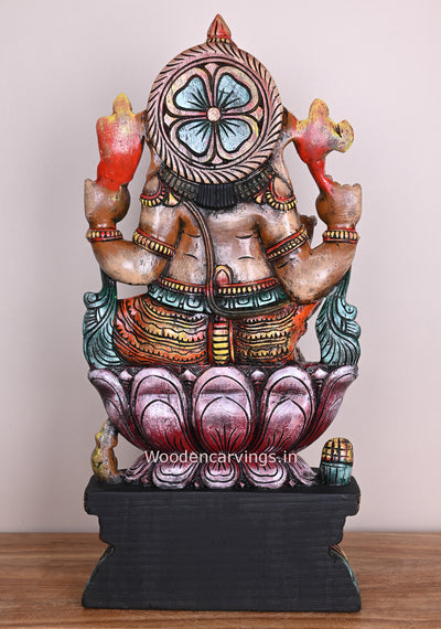 Different Sitting Ganapathi on Pink Lotus Eating Sweet Prasadh Ladoo in His Trunk Wooden Sculpture 25"