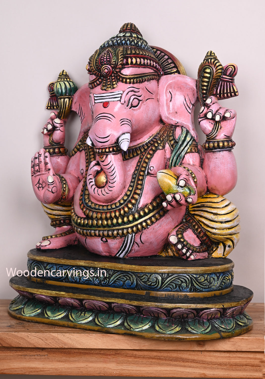 Beautiful Pink Ganapathi Differently Seated On Base and Holding Mango Multicoloured Wooden Sculpture 28"