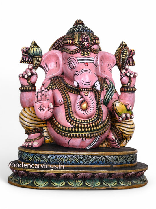 Beautiful Pink Ganapathi Wooden Sculpture Holding Mango - 28" Multicoloured