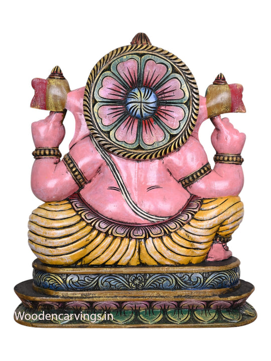 Beautiful Pink Ganapathi Wooden Sculpture Holding Mango - 28" Multicoloured