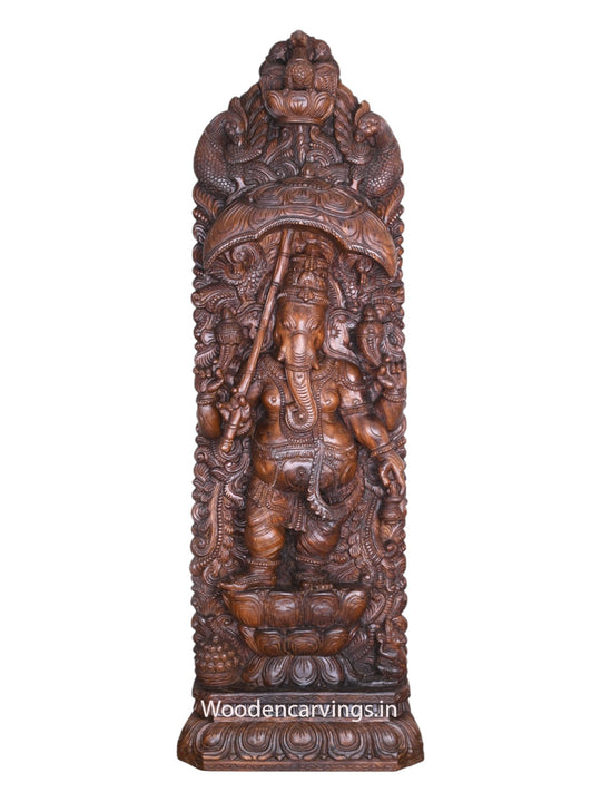 Standing Murthi Ganesha on Double Petal Lotus Holding Umbrella and Kamandalam Peacock Designed Jali Work 60"