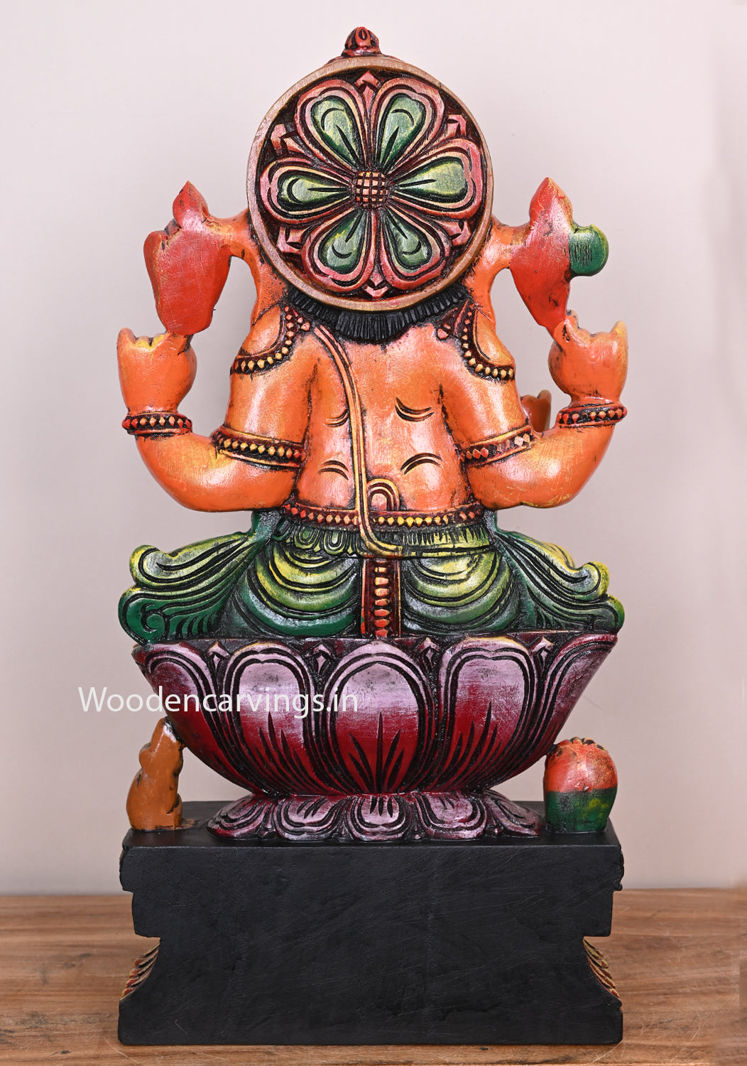 Fascinating Orange Colour Lord Ganapathi Seated on Pink Lotus Wooden Handmade Sculpture 24"