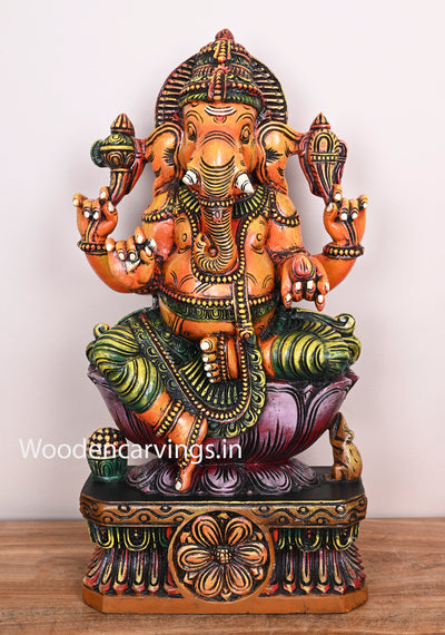 Fascinating Orange Colour Lord Ganapathi Seated on Pink Lotus Wooden Handmade Sculpture 24"