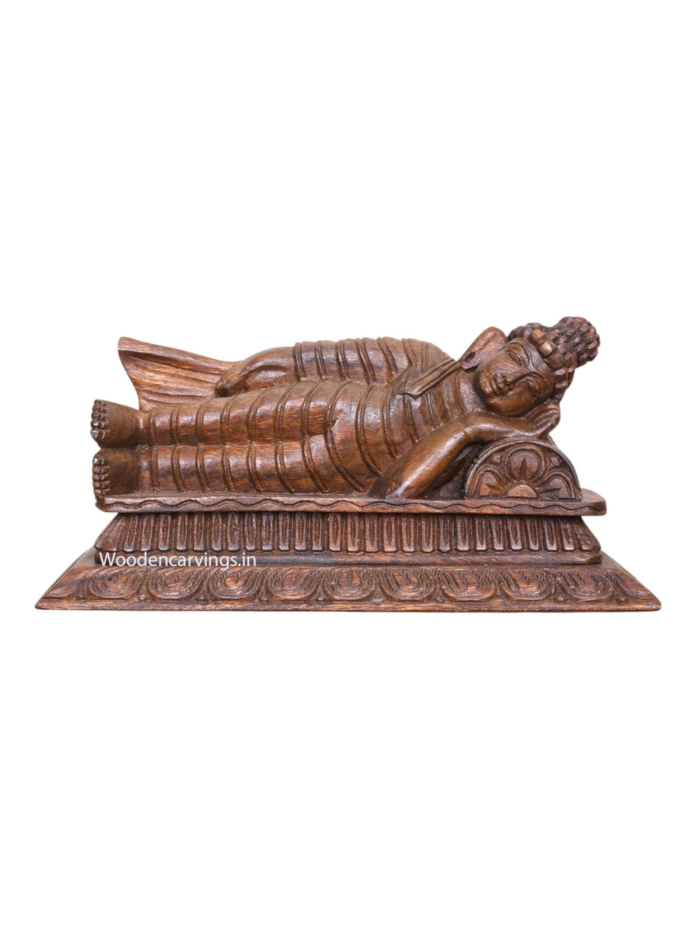 Wooden Buddha on Pillow