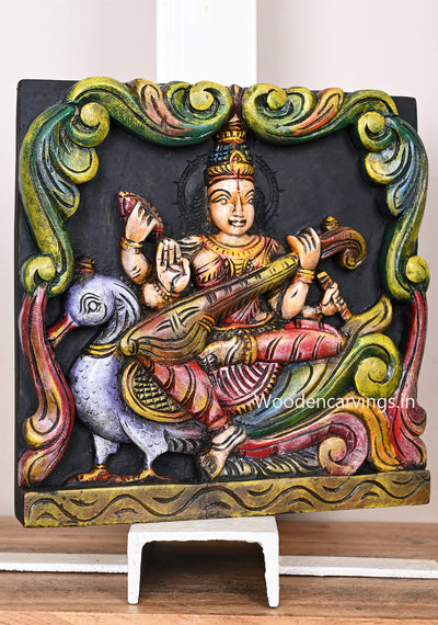Square Beautiful Goddess Saraswathi Seated on Coloured Hamsa Holding Veena and Rosary Wooden Wall Mount 12"