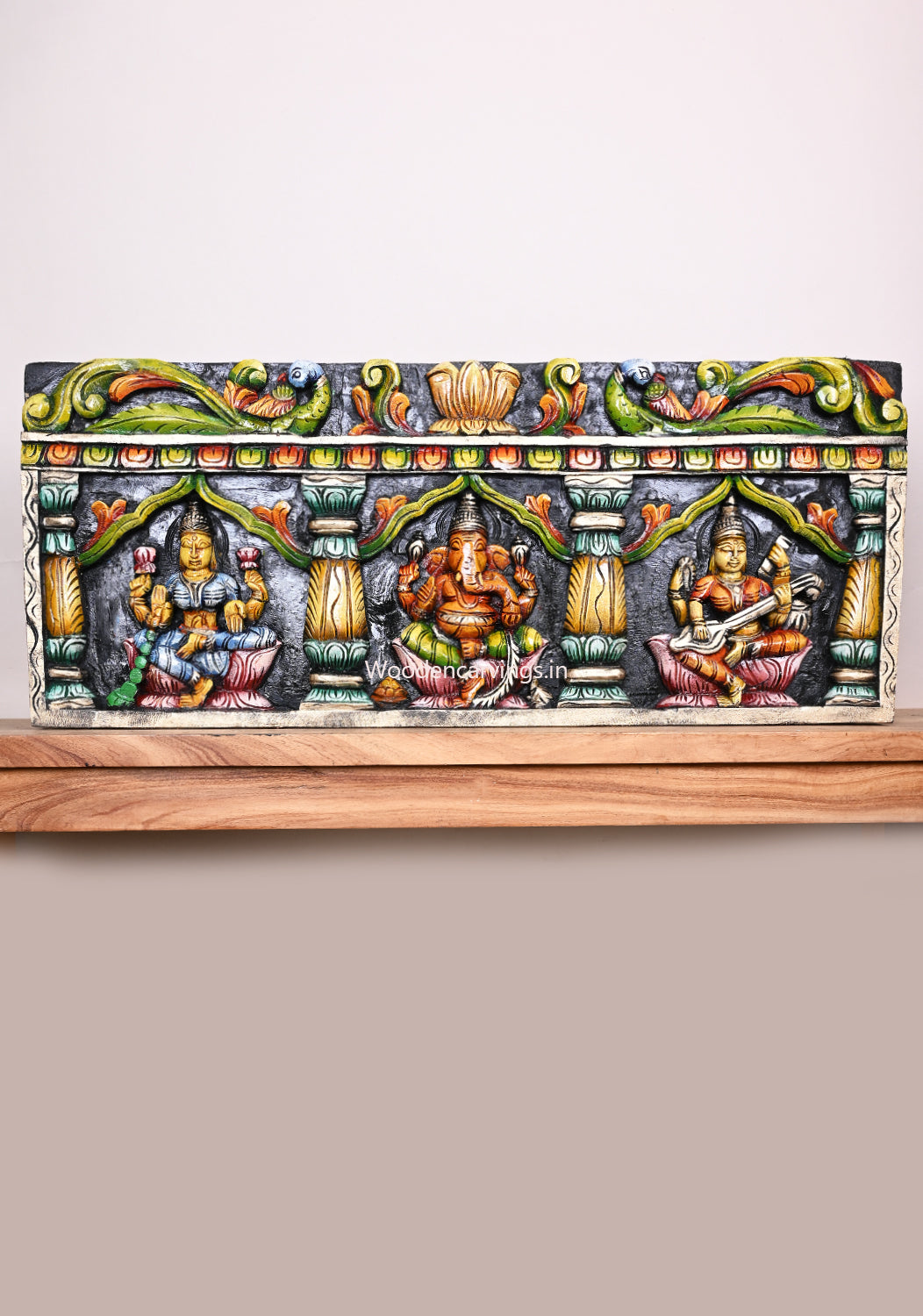 Wooden Ganesha, Lakshmi, Saraswathi  Multicoloured Wooden Wall Panel 36"