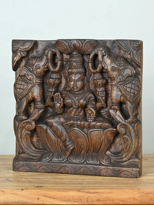 wooden lakshmi devi with elephants