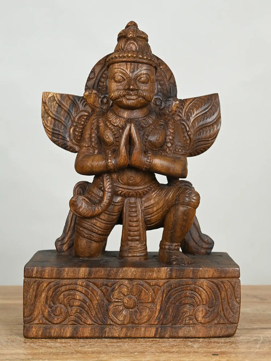 wooden garuda sculpture