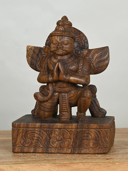 wooden garuda sculpture