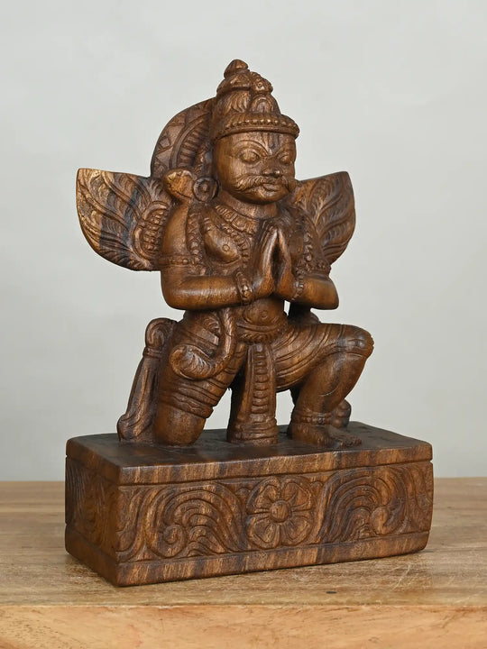 wooden garuda sculpture