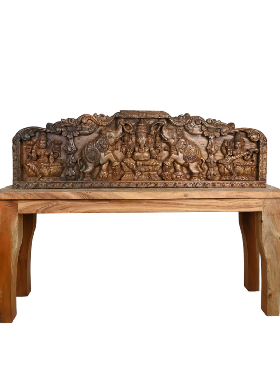 Wooden panel of Ganesha, Lakshmi, and Saraswati