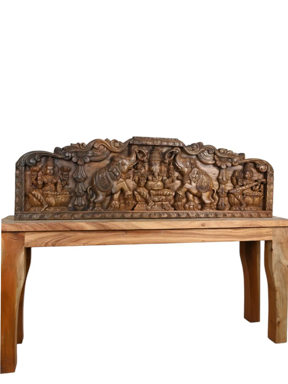 Wooden panel of Ganesha, Lakshmi, and Saraswati