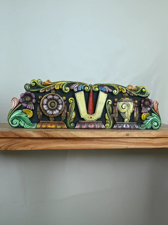 Carved wooden panel Vishnu's Shangu Chakra Namam