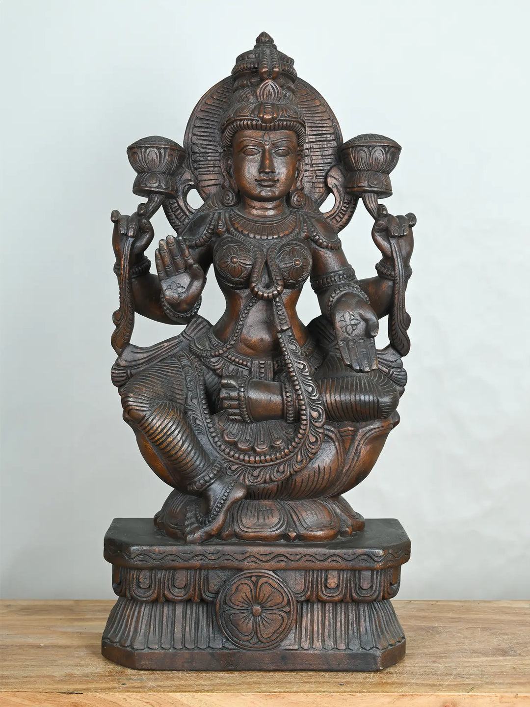 Lakshmi wood carving statue