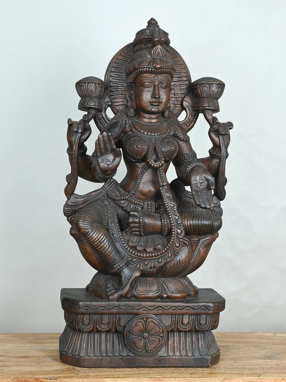 Lakshmi wood carving statue