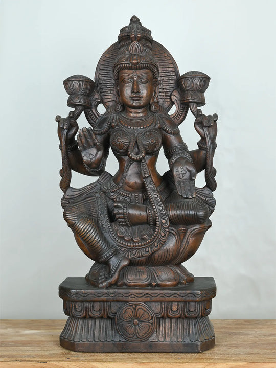 Lakshmi wood carving statue