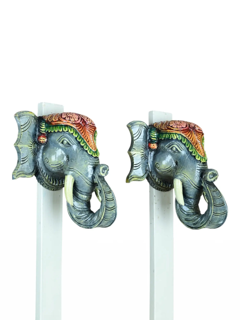 Wooden paired elephant mask
