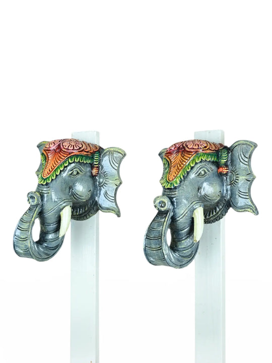 Wooden paired elephant mask
