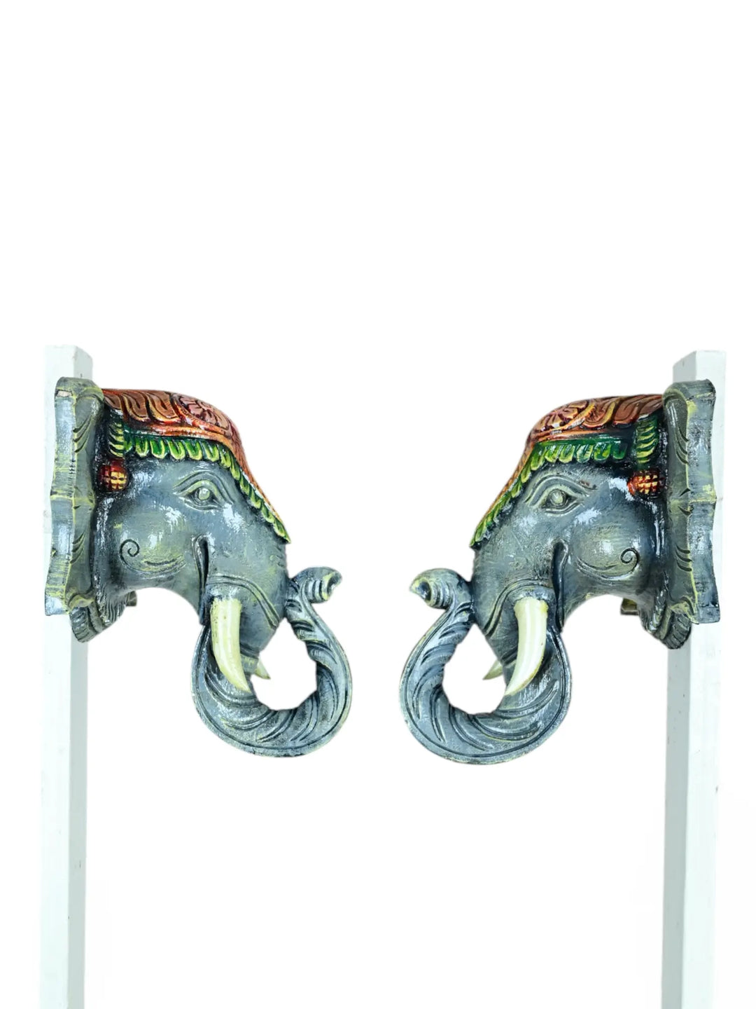 Wooden paired elephant mask