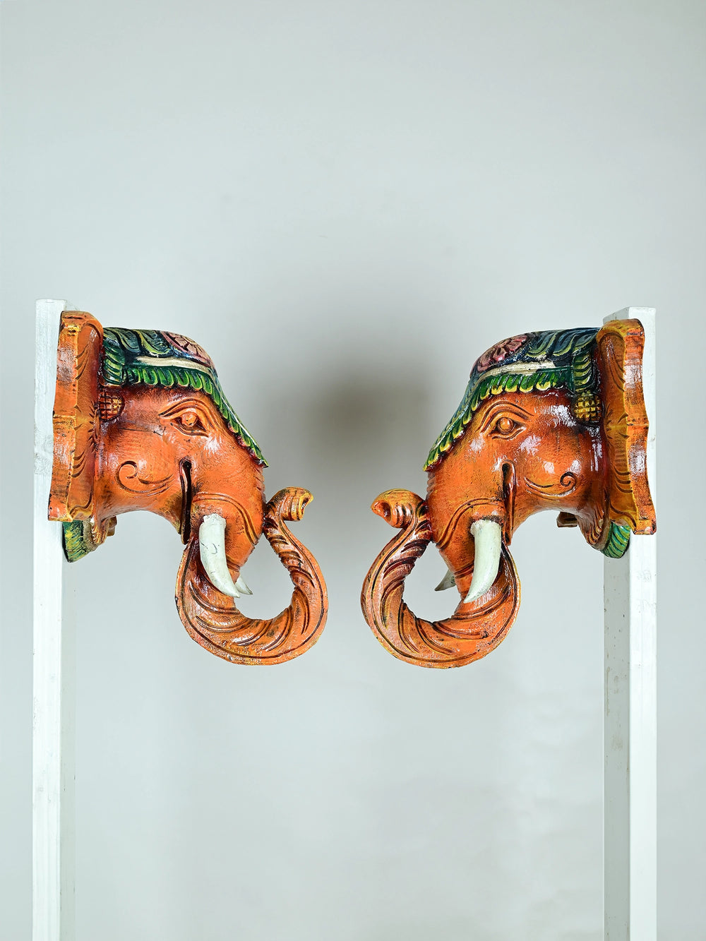 Paired wooden elephant face mask