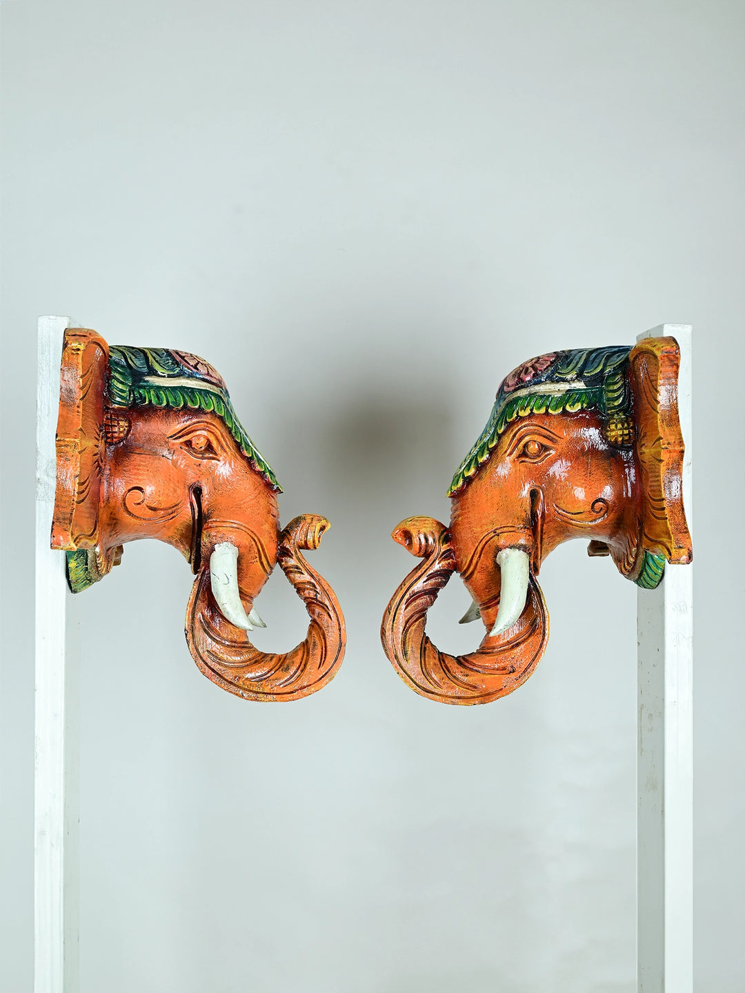 Paired wooden elephant face mask