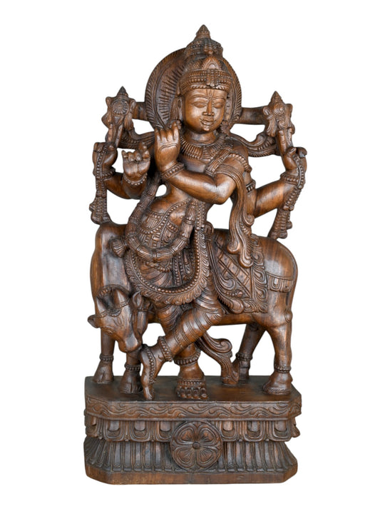 Wooden Krishna statue