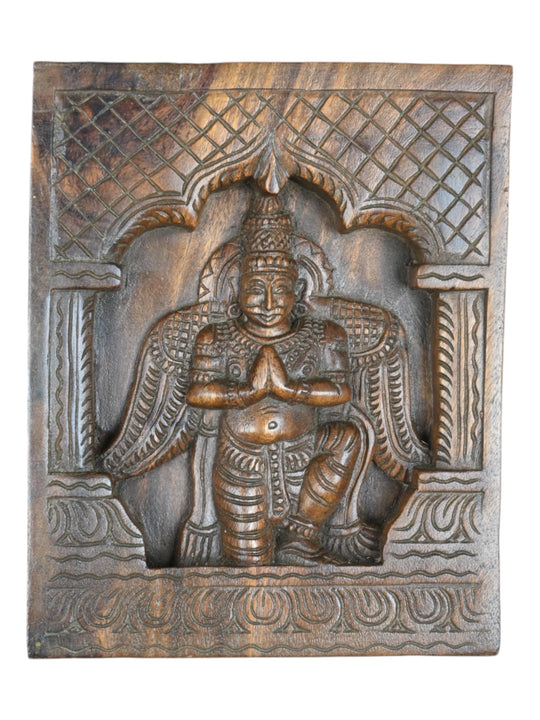 Wooden carving of Garuda