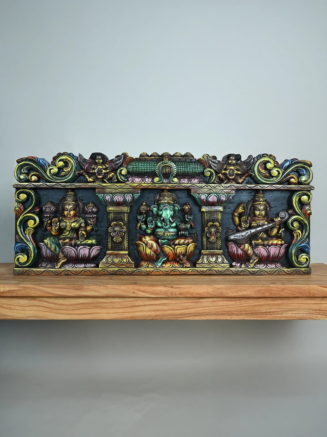 Wood Ganesh with Lakshmi and Saraswathi panel