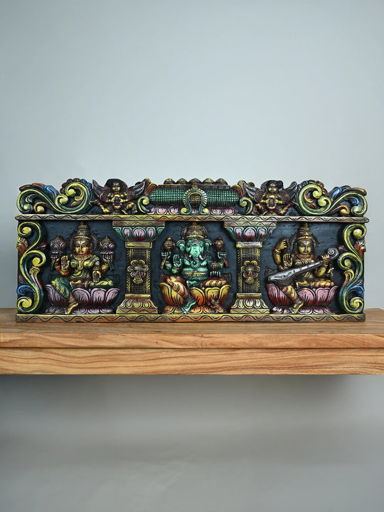 Wood Ganesh with Lakshmi and Saraswathi panel