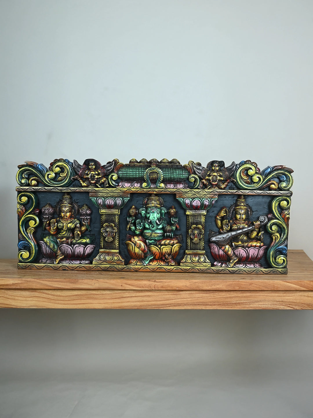 Wood Ganesh with Lakshmi and Saraswathi panel