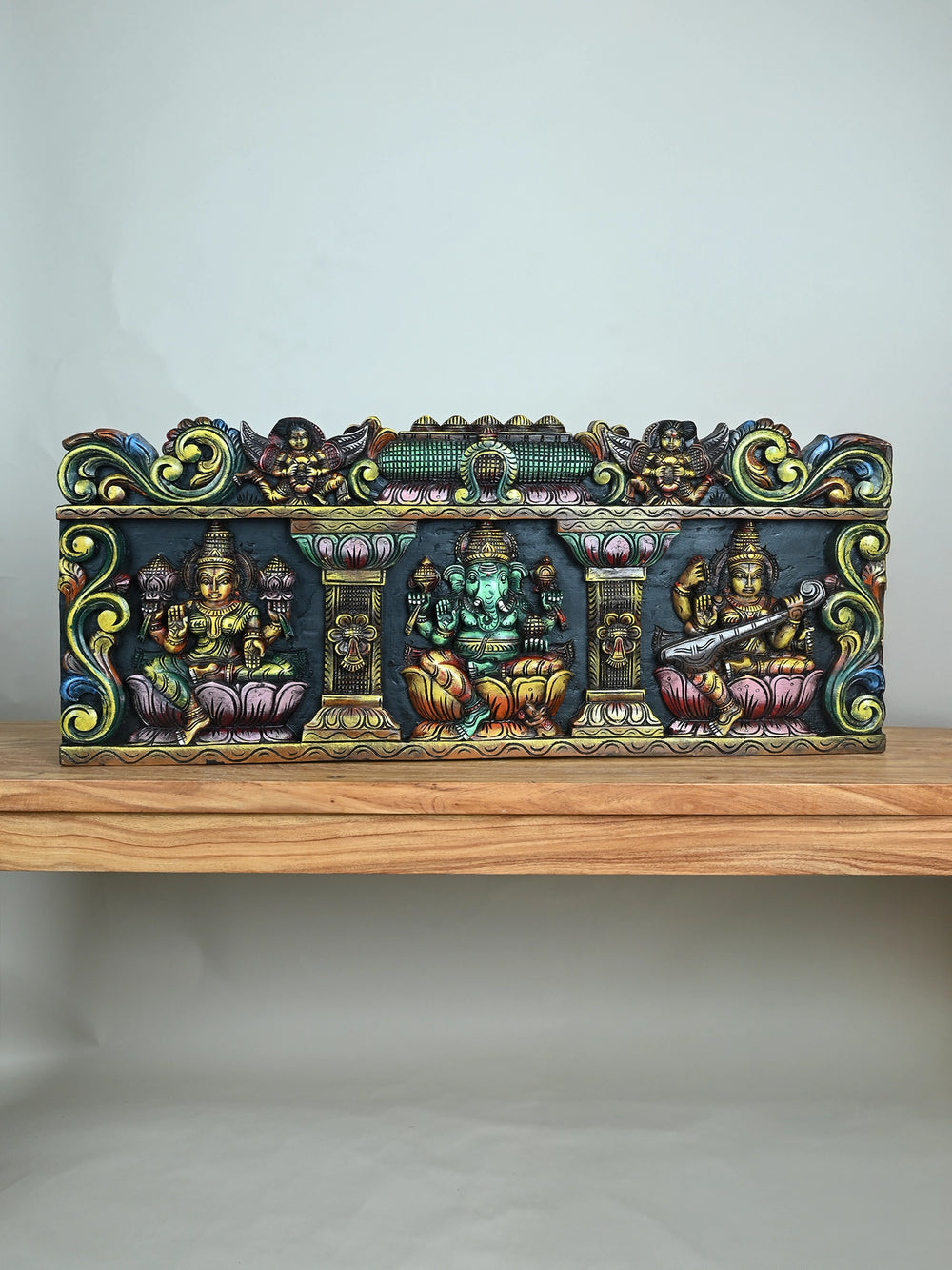 Wood Ganesh with Lakshmi and Saraswathi panel