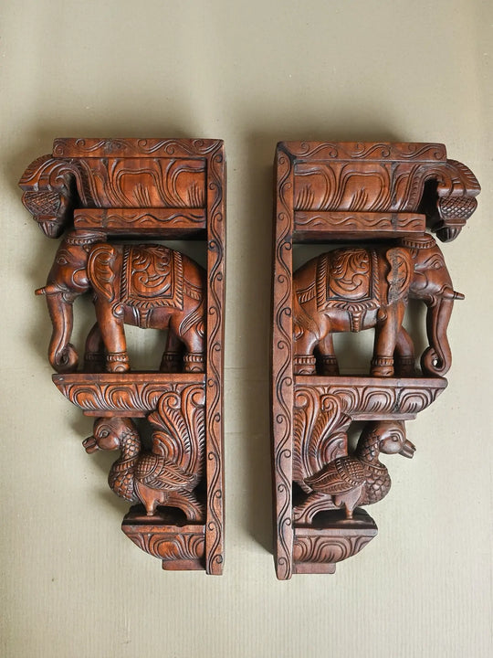 wooden elephant and hamsa brackets