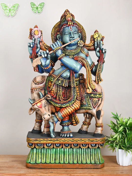 Wooden Krishna with cow statue