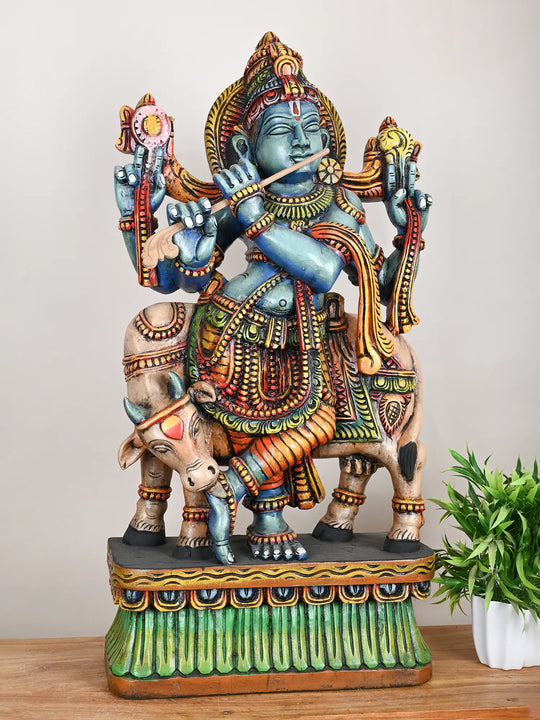 Wooden Krishna with cow statue