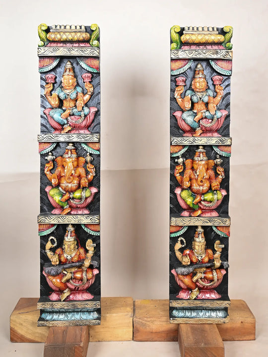 Wooden panel of Ganesh, Lakshmi, and Saraswathi 