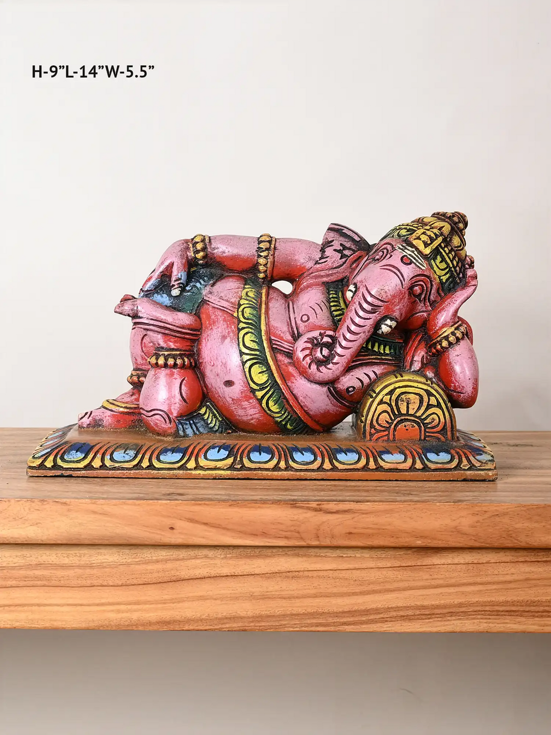 Reclining ganesh wooden statue