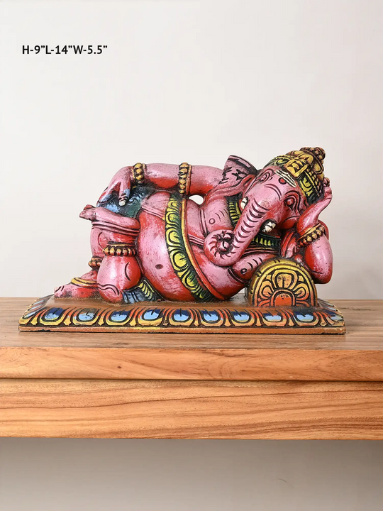 Reclining ganesh wooden statue
