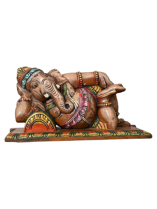 wooden reclining ganesh statue
