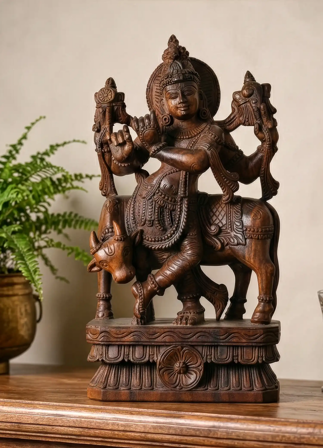 wooden krishna statue