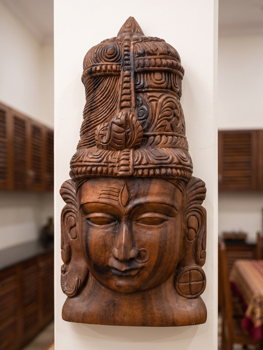 Spiritual wooden Shiva face carving