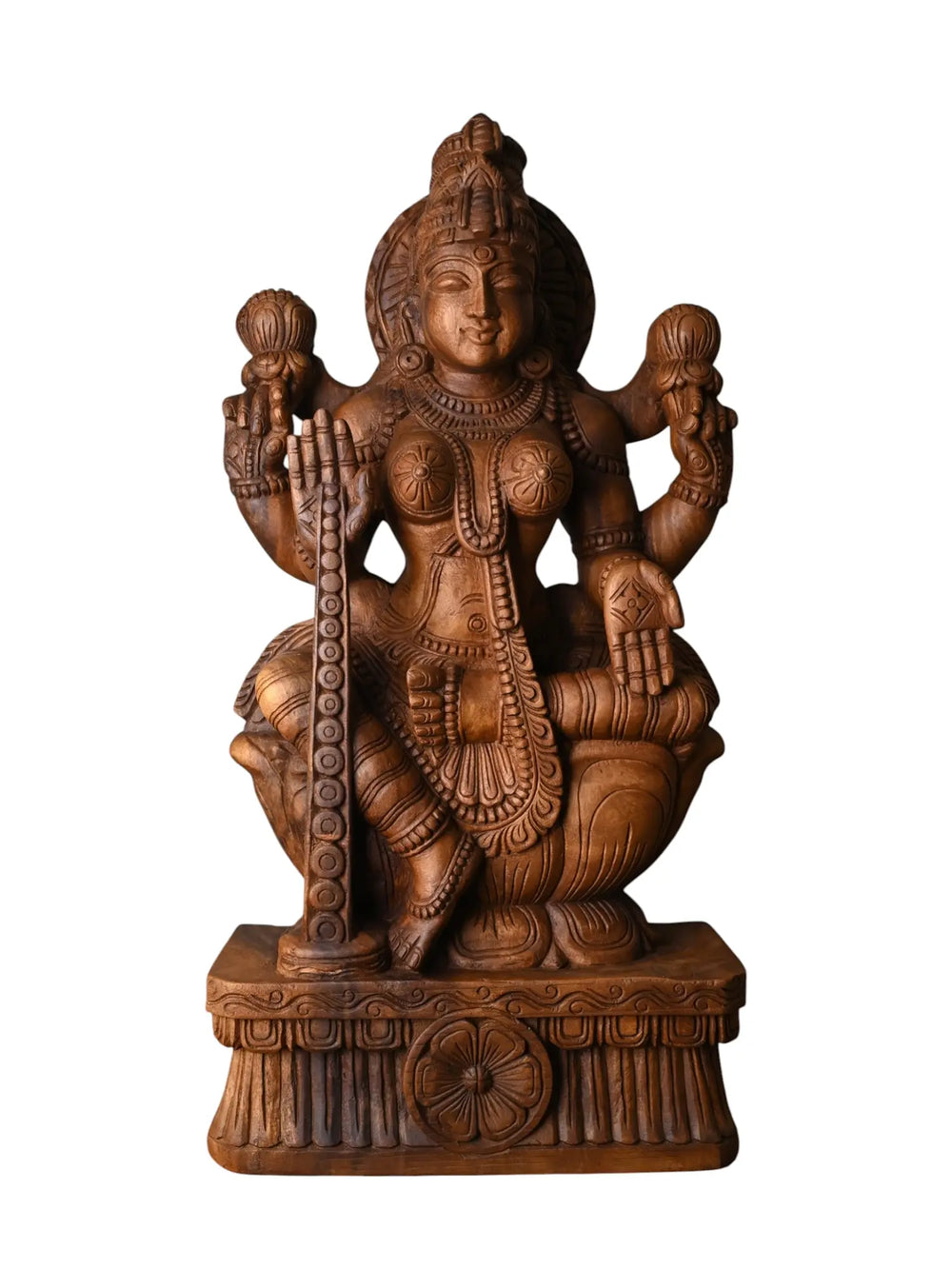 Traditional Goddess Lakshmi idol in detailed wood carving