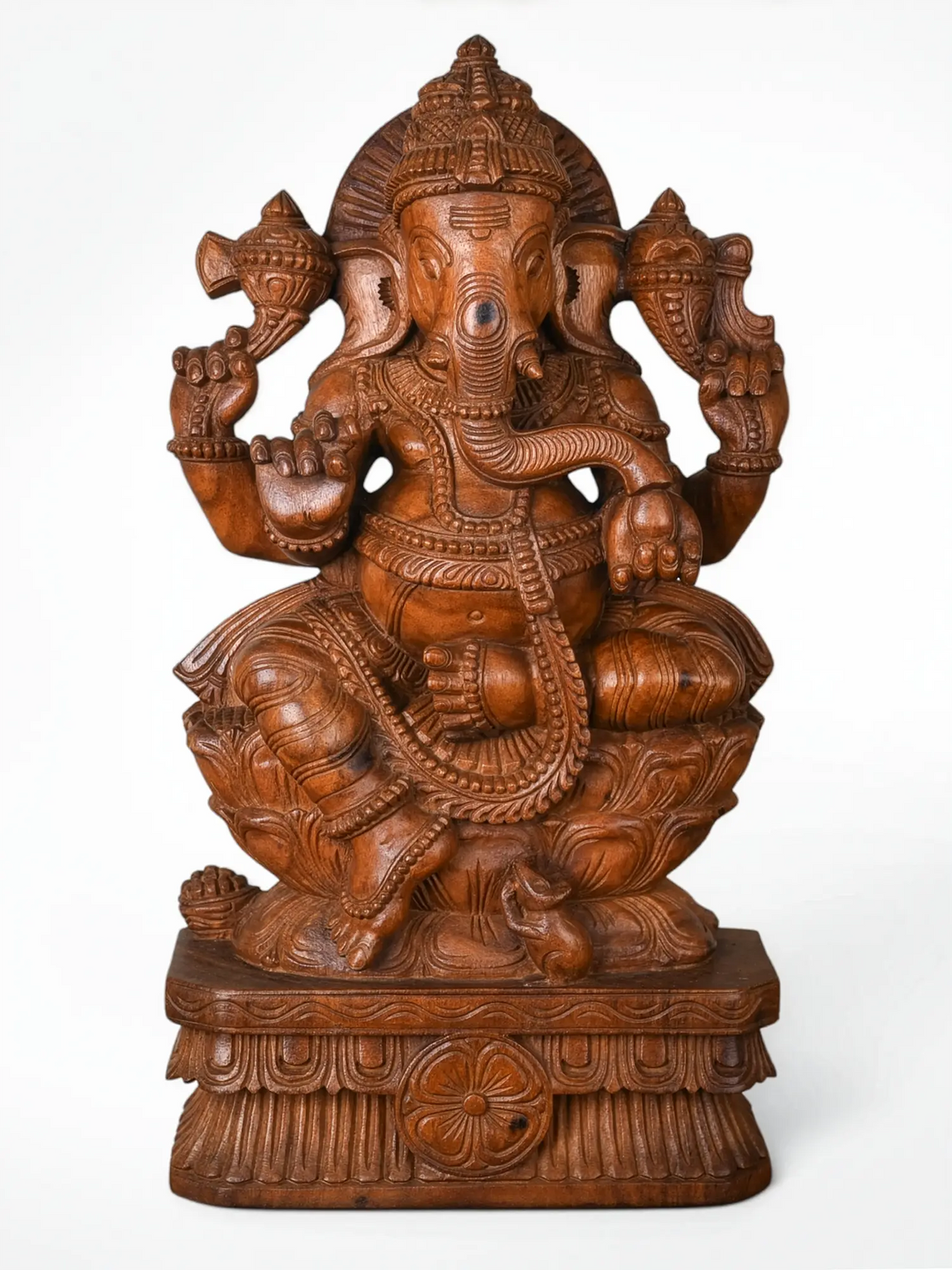 Wooden Ganpati idol with lotus pedestal for prosperity and positive energy